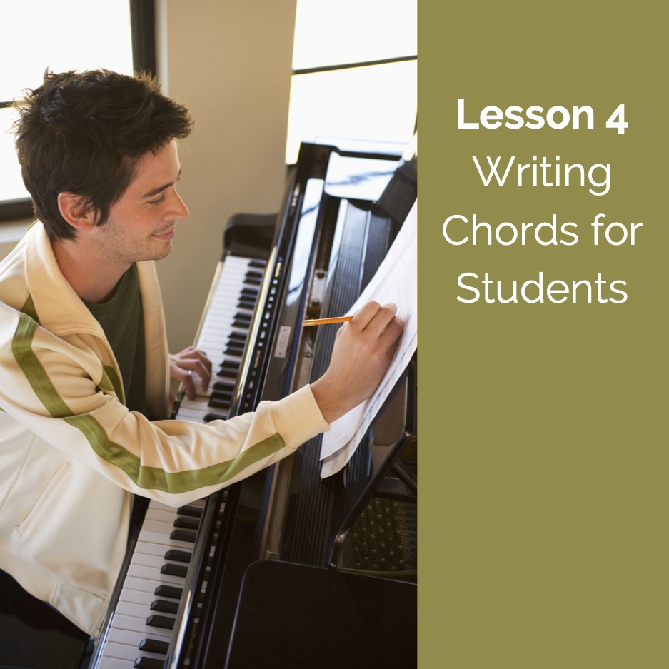 A piano teacher writing on staff paper while testing chords.